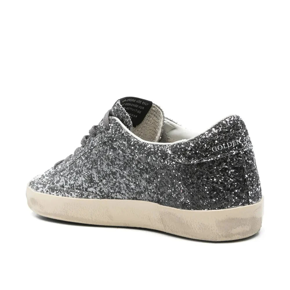 Golden Goose Super Star trainers with glitter upper and silver metallic leather star
