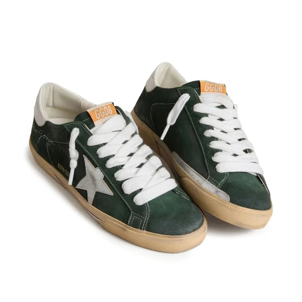 Golden Goose Super-Star trainers in green suede with silver metallic leather star and leather heels tab